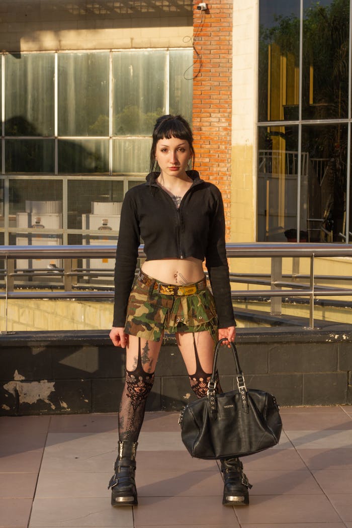 Young woman in stylish urban fashion posing outdoors in Argentina.